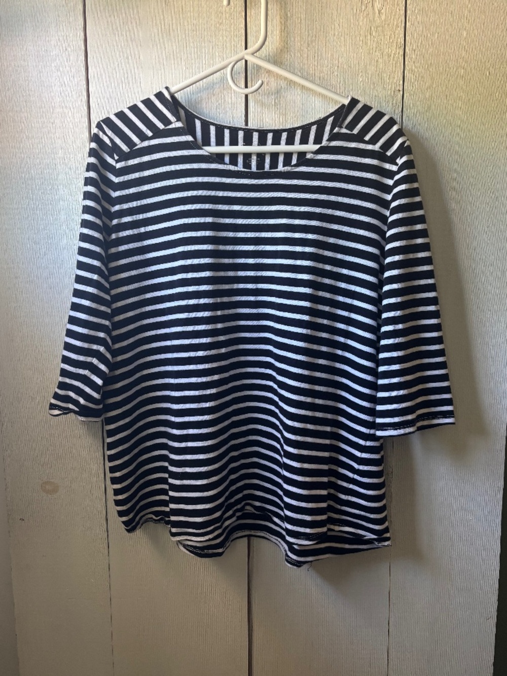 Woman’s navy & white striped quarter sleeve top